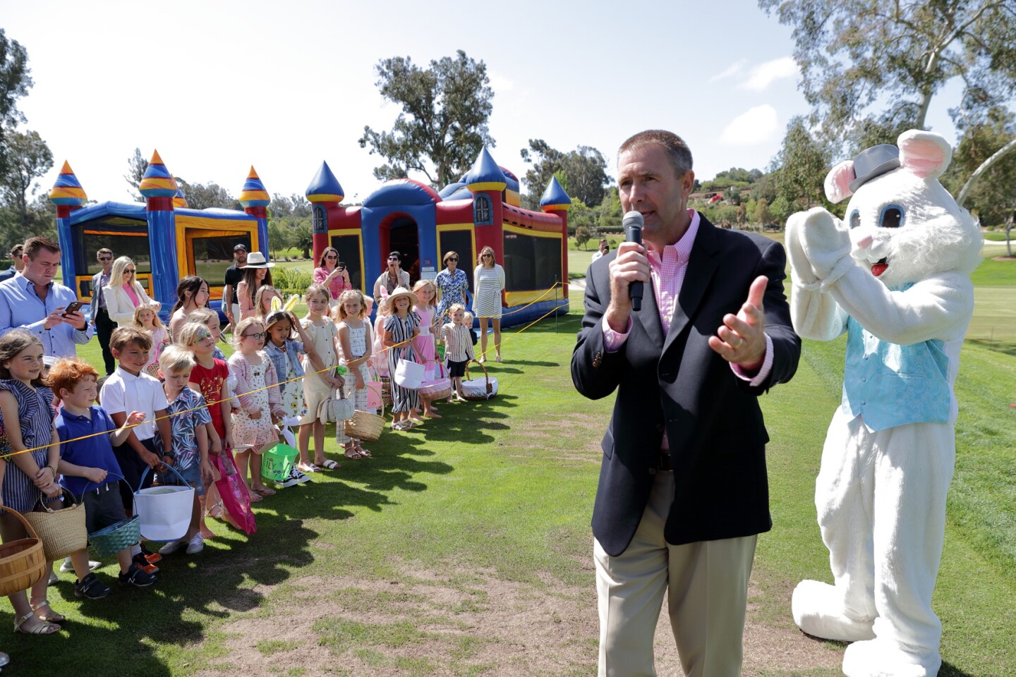 RSF Golf Club general manager Todd Huizinga asks the children to line up for the Easter Egg Hunt