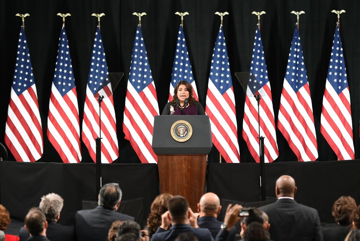 Immigration activist Astrid Silva introduces President Obama at Del Sol High School on Friday in Las Vegas.