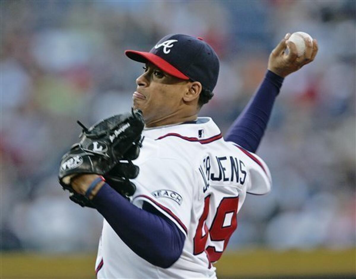 Atlanta Braves Mark Teixeira runs home during the first inning