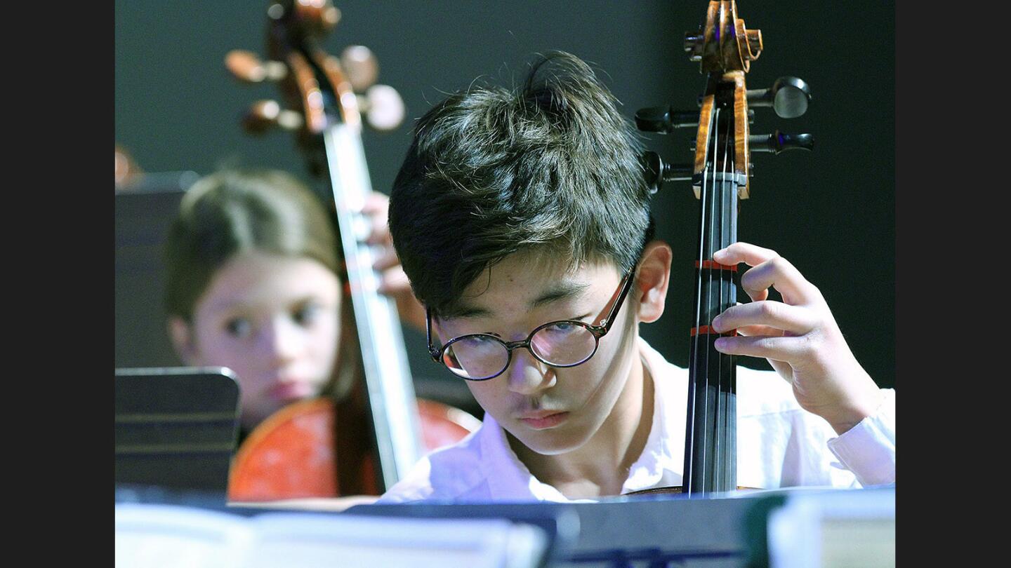 Joseph Paik, 11, plays cello with the first year beginning stings at the 2016 Winter Concert presented by the Assistance League of Flintridge at Lanterman Auditorium in La Cañada Flintridge on Tuesday, December 20, 2016. The program highlighted students in the music programs at La Cañada Elementary, Palm Crest Elementary, and Paradise Canyon Elementary.