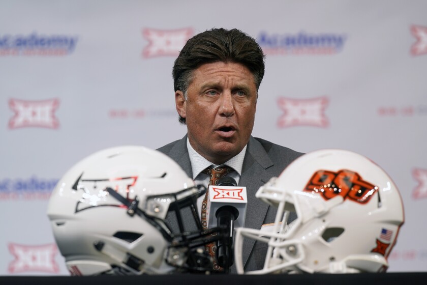 Oklahoma State head coach Mike Gundy speaks during the NCAA college football Big 12 media days Thursday, July 15, 2021, in Arlington, Texas. (AP Photo/LM Otero)