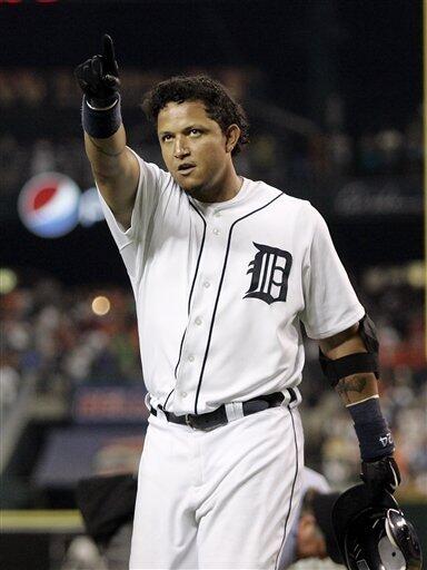 Florida Marlins' Miguel Cabrera stands on first base after hitting
