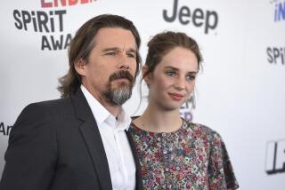 Ethan Hawke, left, and Maya Hawke arrive at the 33rd Film Independent Spirit Awards on Saturday, March 3, 2018, in Santa Monica, Calif. (Photo by Jordan Strauss/Invision/AP)