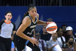 FILE - Chicago Sky's Candace Parker starts a fast break during Game 1 of the team's WNBA basketball semifinal.