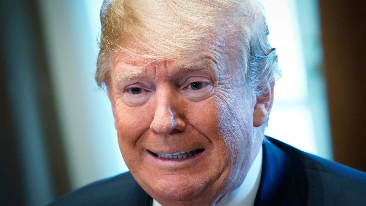 President Trump speaks during a meeting with Republican members of Congress and Cabinet members at the White House on Wednesday.