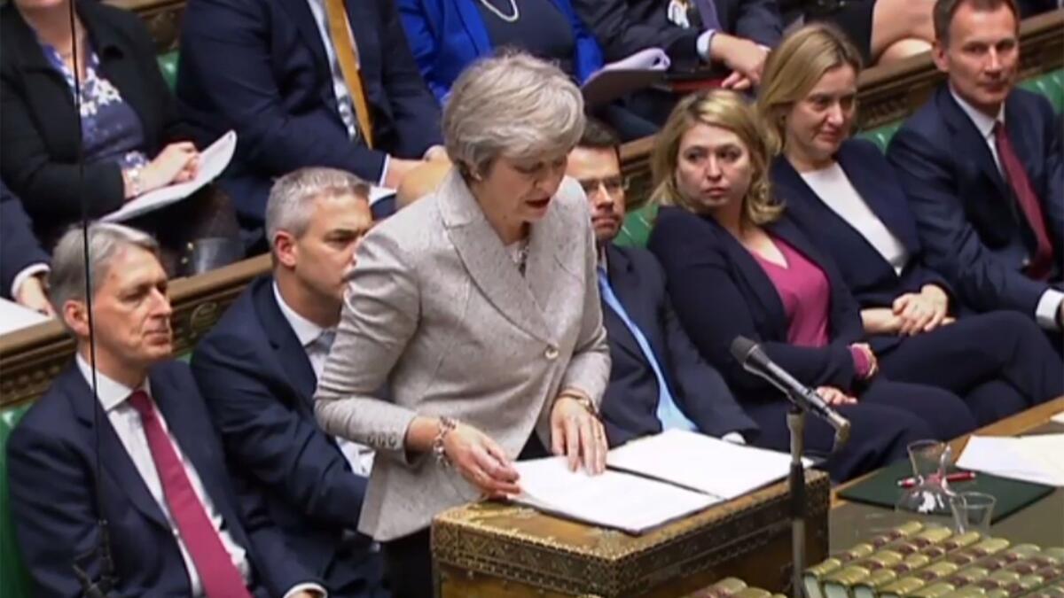 British Prime Minister Theresa May speaks to the House of Commons about a draft declaration laying out plans for future relations with the European Union.