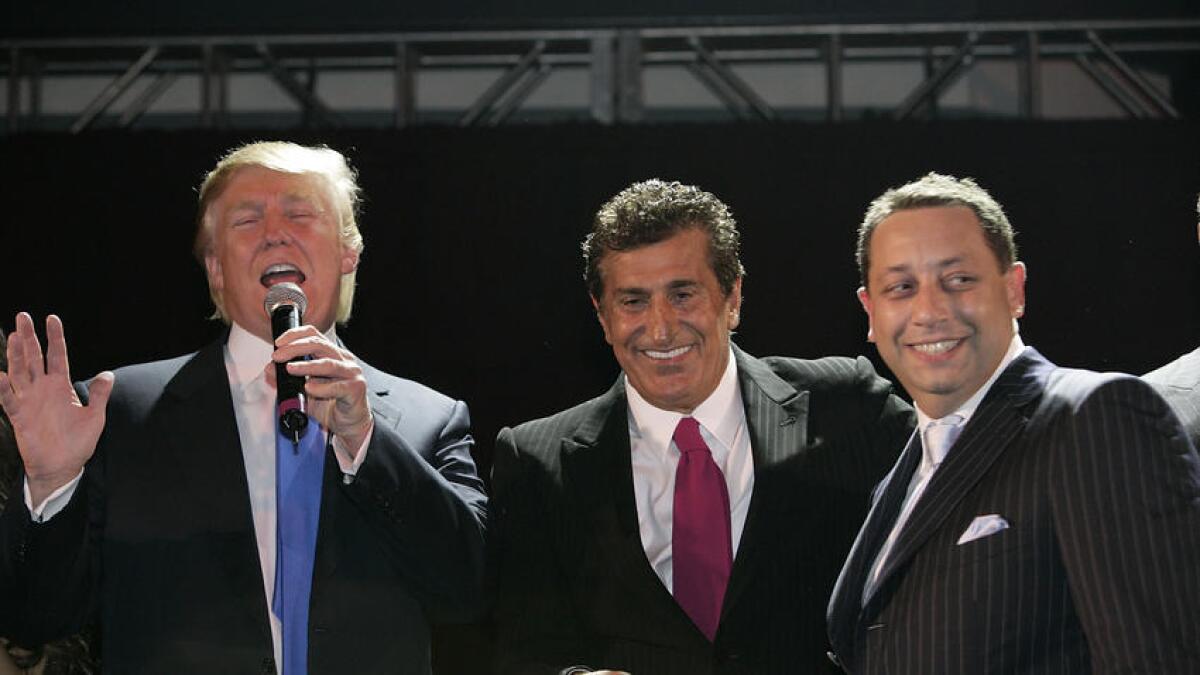 Donald Trump, Bayrock Group founder Tevfik Arif and Felix Sater, right, in New York in 2007.