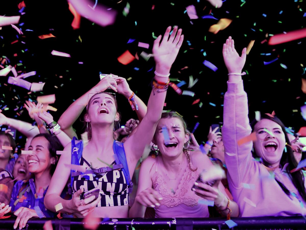 Fans go wild during a performance by Tame Impala. (Mariah Tauger / Los Angeles Times)