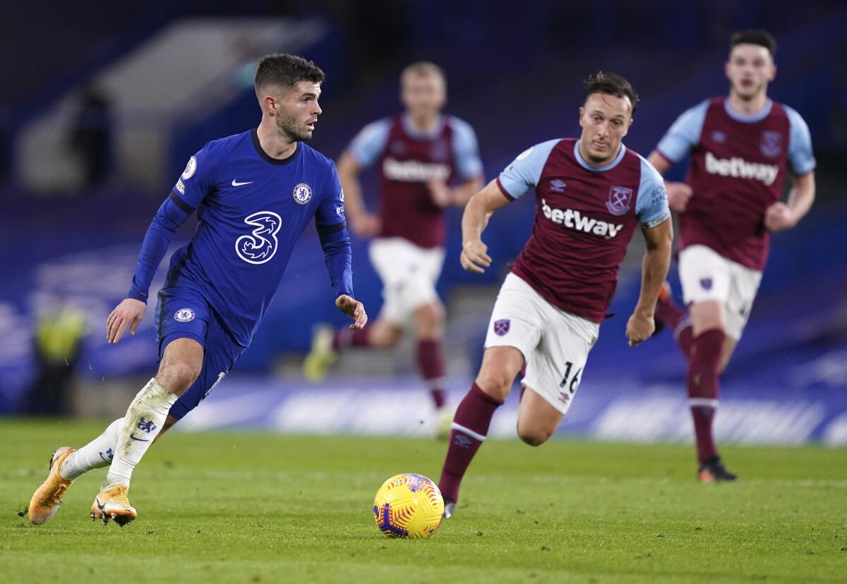 Chelsea's Christian Pulisic looks to pass the ball against West Ham.