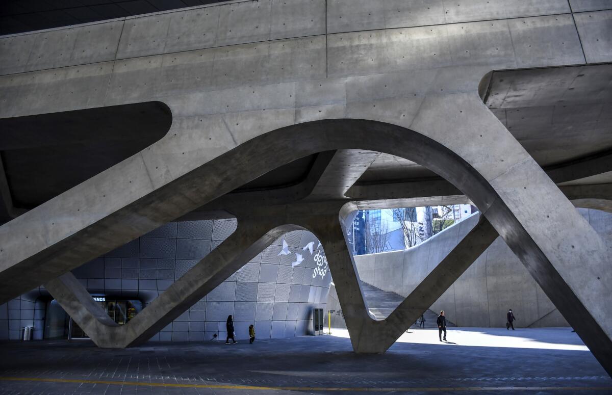 Dongdaemun Design Plaza in Seoul is a vast, curvy cultural center designed by the late Zaha Hadid and opened in 2013. Part of the complex houses temporary exhibits and part houses design-oriented retailers.
