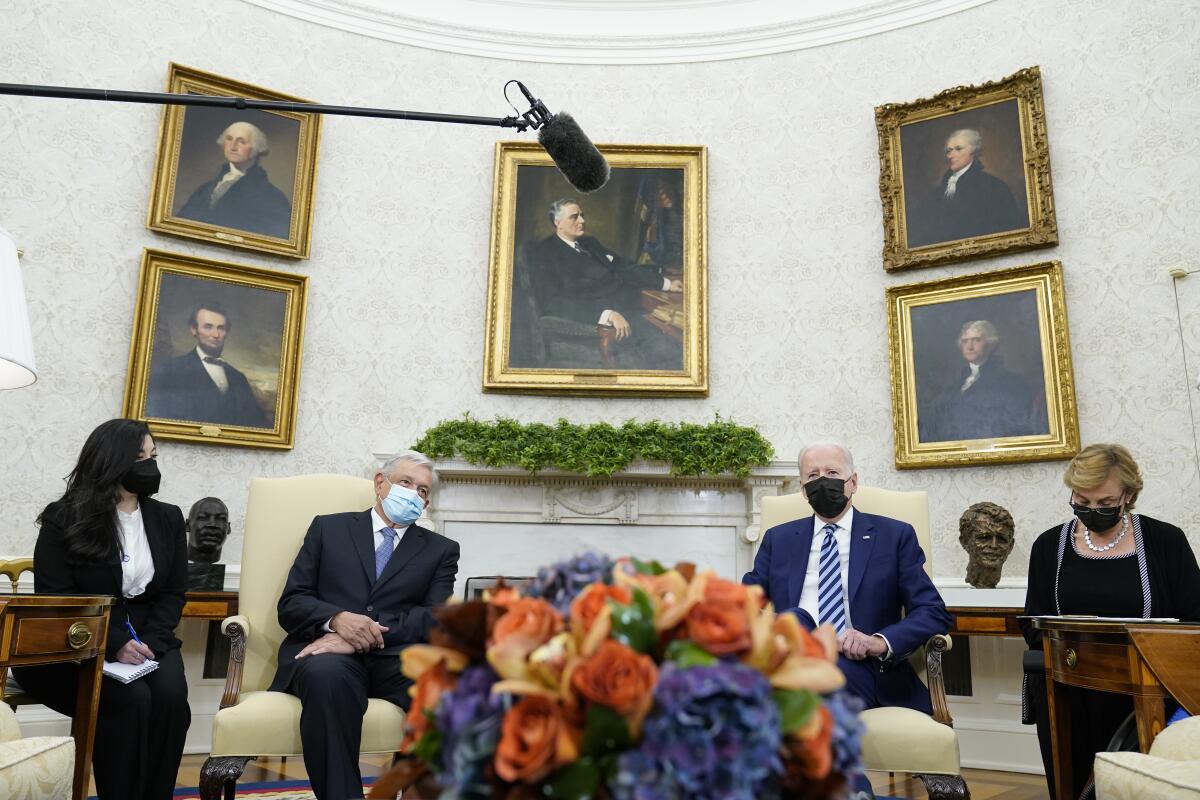 President Biden and Mexican President Andrés Manuel López Obrador sit in the Oval Office