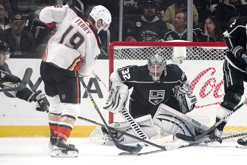 Anaheim Ducks player scoring goal against Los Angeles Kings