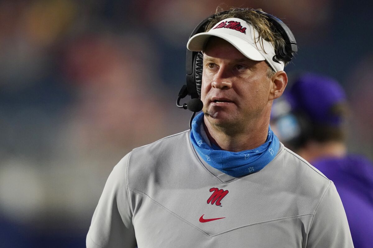 Ole Miss coach Lane Kiffin watches a replay during a game against Tulane on Sept. 18 in Oxford, Miss.