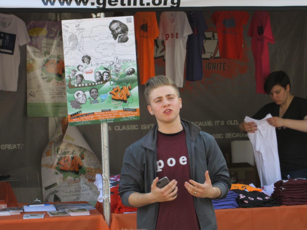 Adrian Kljucec, 17, performs a spoken-word piece at the Get Lit booth Saturday at the Festival of Books.
