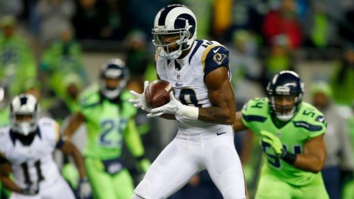 Rams receiver Kenny Britt catches a pass during a game against the Seahawks on Dec. 15.