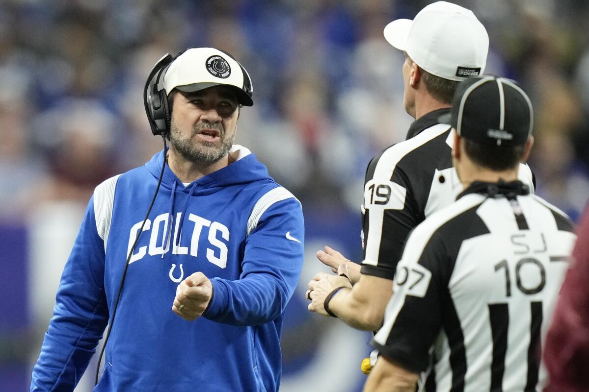 Indianapolis Colts interim head coach Jeff Saturday questions a call during the second half of an NFL football game against the Los Angeles Chargers, Monday, Dec. 26, 2022, in Indianapolis. (AP Photo/AJ Mast)