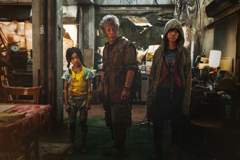 Lee Ye-won as Yu-jin, left, Kwon Hae-hyo as Mr. Kim and Lee Re as Jooni in 