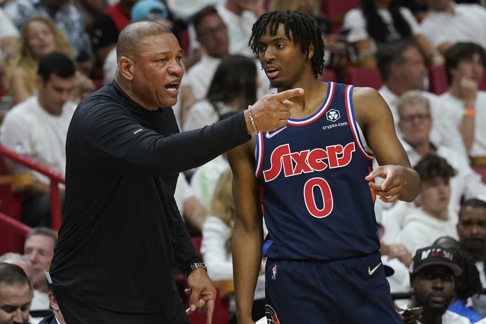 Philadelphia coach Doc Rivers talks to guard Tyrese Maxey on the sideline.