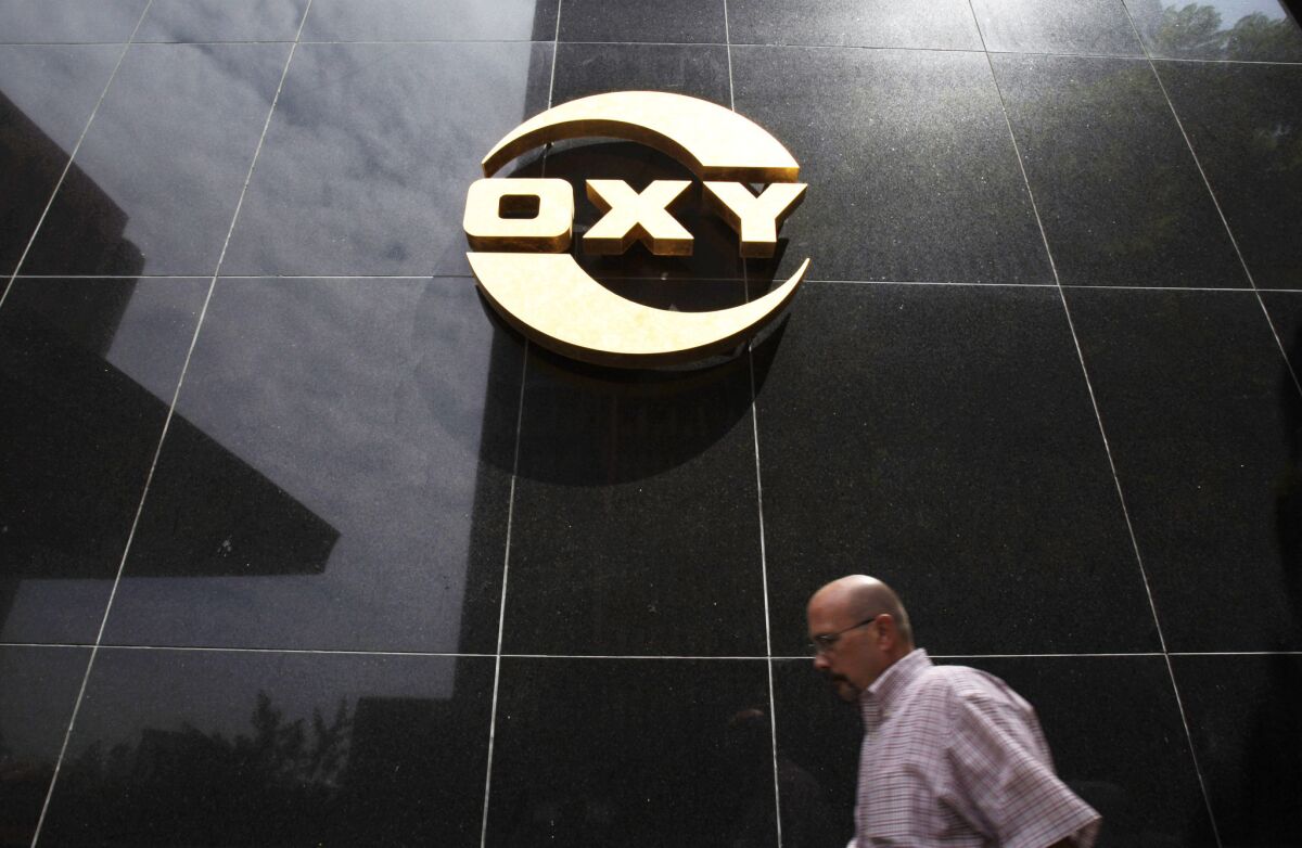 Occidental Petroleum said third-quarter earnings jumped by more than 14%.