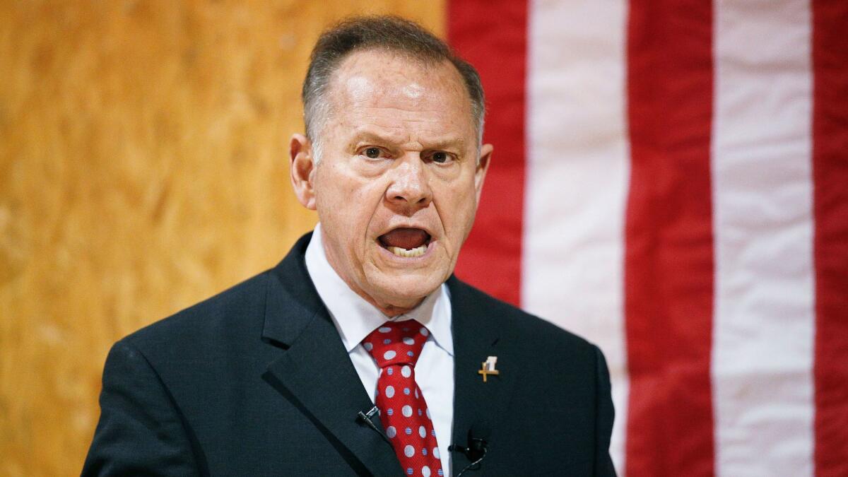 Former Alabama Chief Justice and U.S. Senate candidate Roy Moore speaks at a campaign rally, in Dora, Ala. on Nov. 30.