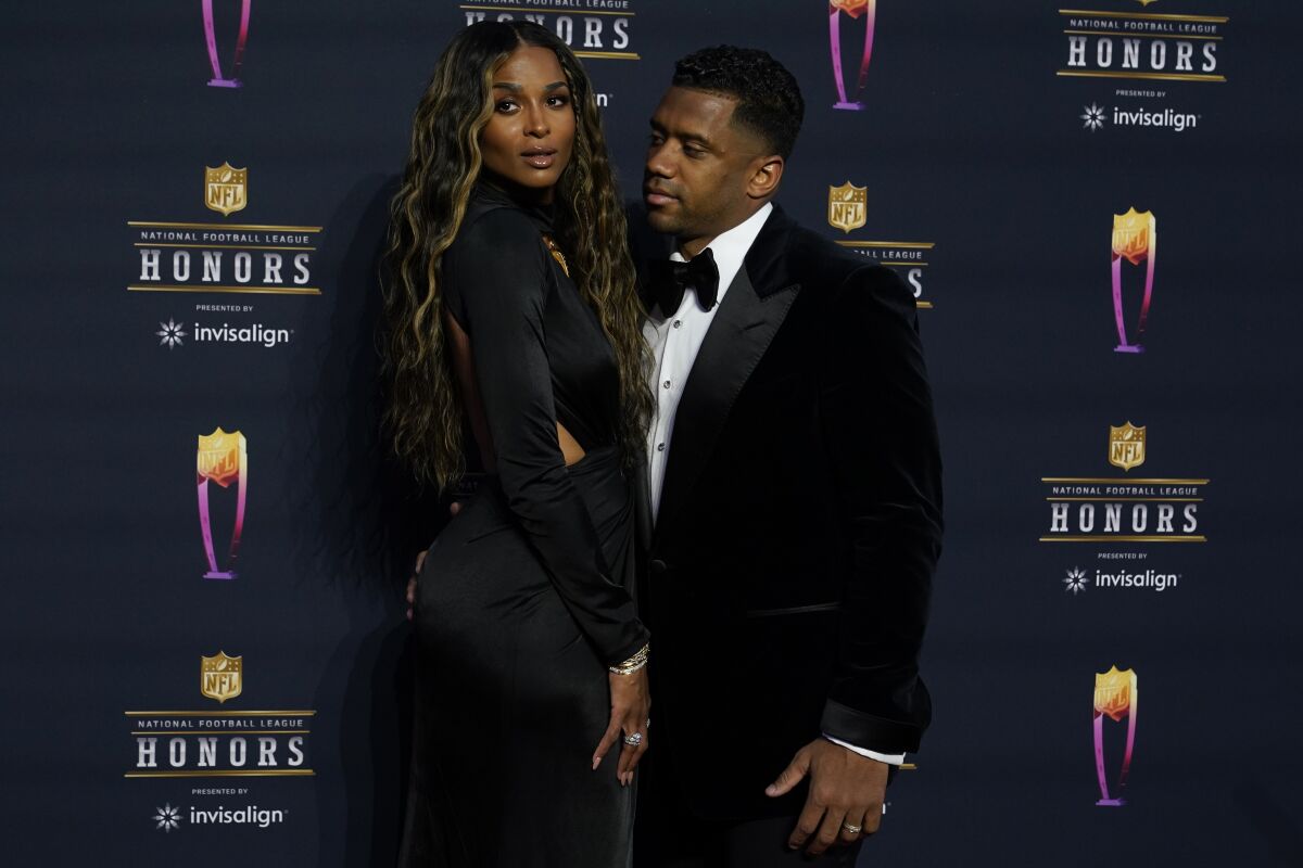 Russell Wilson and wife Ciara arrive for the NFL Honors show Thursday, Feb. 10, 2022, in Inglewood, Calif. (AP Photo/Marcio Jose Sanchez)