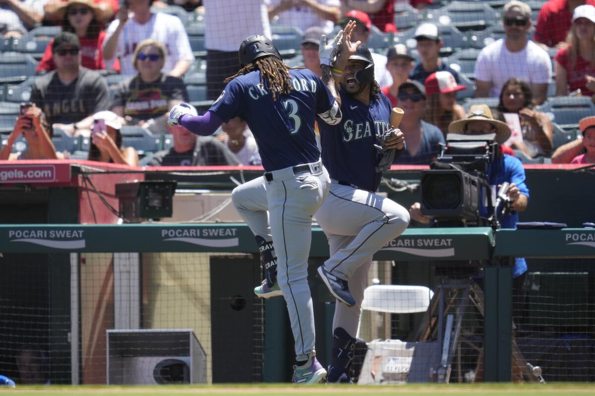 Teoscar Hernandez of the Seattle Mariners celebrates with