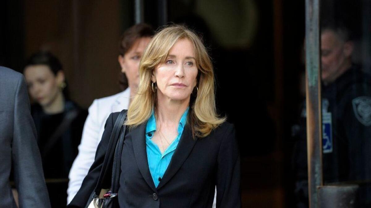 Felicity Huffman outside federal court in April 2019