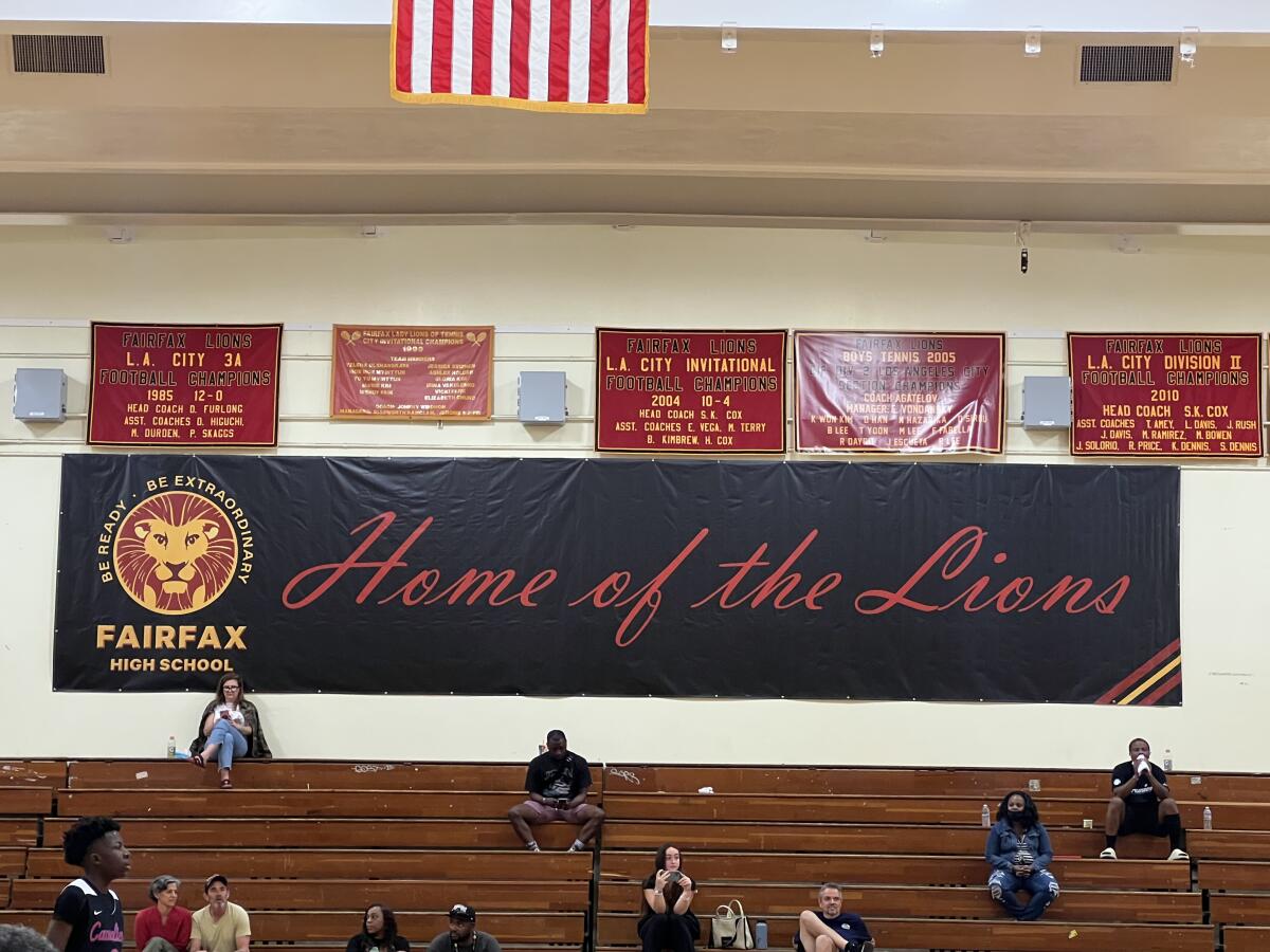 Fairfax High's historic gymnasium, shown inside with a school banner, will be demolished and replaced with a new gymnasium. 