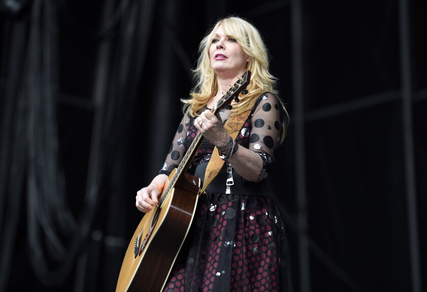 FILE - Nancy Wilson of Heart performs at RFK Stadium in Washington on July 4, 2015. Wilson released her first solo album, “You and Me.” (Photo by Nick Wass/Invision/AP, File)