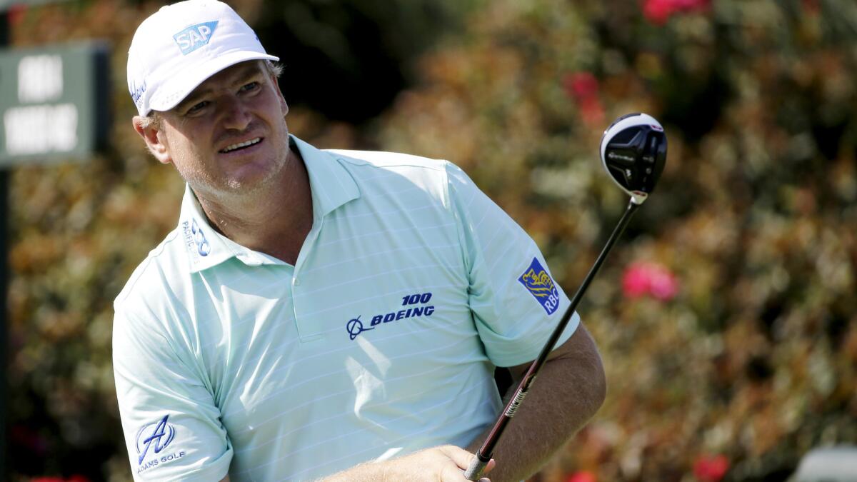 Ernie Els watches his tee shot at No. 10 on Thursday during the first round of the Players Championship.