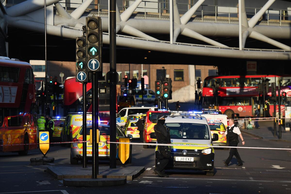 Traffic is stopped behind a police cordon Friday near London Bridge