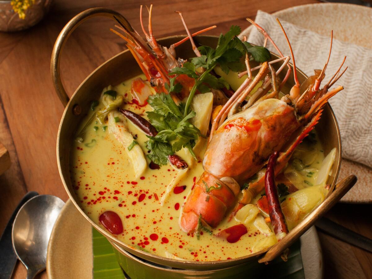 Going to Thailand? Learning more about a cuisine by preparing a favorite dish such as this tom kha goong, a coconut soup with langostine, will deepen your knowledge of your destination.