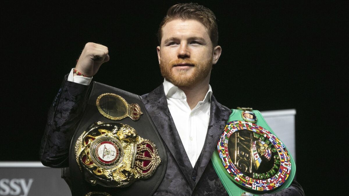 Boxer Canelo Alvarez poses for photos at Madison Square Garden on Oct. 17. His Dec. 15 bout against Rocky Fielding will be the first in his 11-fight deal with DAZN.