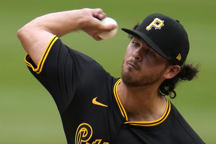Pittsburgh Pirates starting pitcher Jared Jones delivers during the first inning of a baseball game against the Colorado Rockies in Pittsburgh, Saturday, May 4, 2024. (AP Photo/Gene J. Puskar)