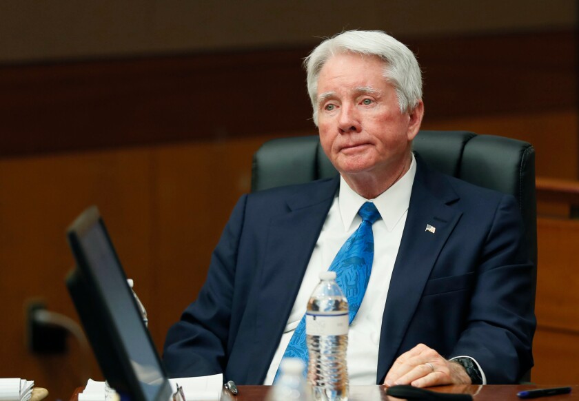 FILE - This April 17, 2018 file photo shows Claud "Tex" McIver, left, during closing arguments in McIver's trial at the Fulton County Courthouse, in Atlanta. Georgia's highest court on Thursday, June 30, 2022, threw out a murder conviction for the once-prominent Atlanta attorney who fatally shot his wife as they rode in an SUV, saying the jury should have had the option to convict him of on a misdemeanor involuntary manslaughter charge.(Bob Andres/Atlanta Journal-Constitution via AP)