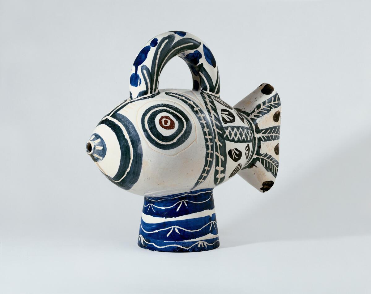 "Fish" by Pablo Picasso. White earthenware and assembled elements, incised, painted with slip, colored glaze, 40 centimeters by 44 centimeters by 21 centimeters.