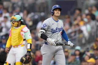 Los Angeles Dodgers' Shohei Ohtani reacts after striking out during the first inning of a baseball game against the San Diego Padres, Friday, May 10, 2024, in San Diego. (AP Photo/Gregory Bull)