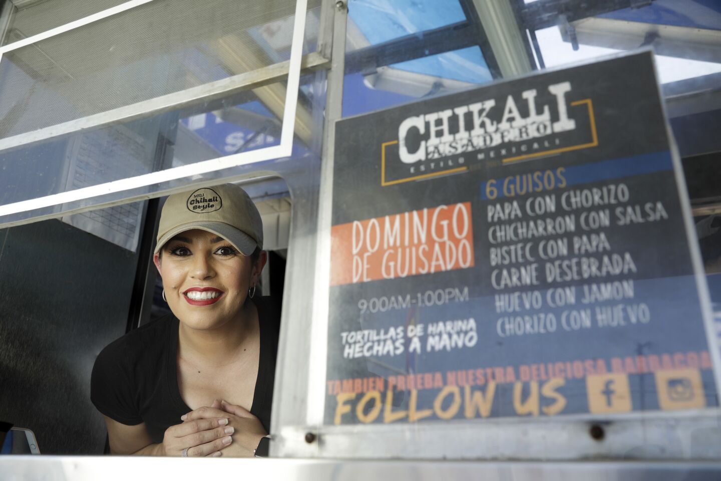 Ana Perez and her family own the taco truck Asadero Chikali. The business started out of her mother's house, and eventually they saved enough money for the truck they bought last October. For the past three months, the truck has set up at an auto dealership lot on South Atlantic Boulevard in East Los Angeles, serving breakfast, lunch and dinner.