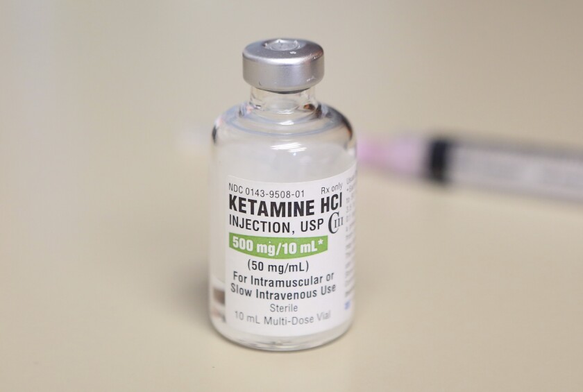 FILE - This photo shows a vial of ketamine, which is normally stored in a locked cabinet, July 25, 2018 in Chicago. Colorado's health department says emergency workers should not use a condition involving erratic behavior by people as a reason to inject them with the drug ketamine. Most states and ambulance agencies can use ketamine when people exhibit the condition called excited delirium. (AP Photo/Teresa Crawford, File)