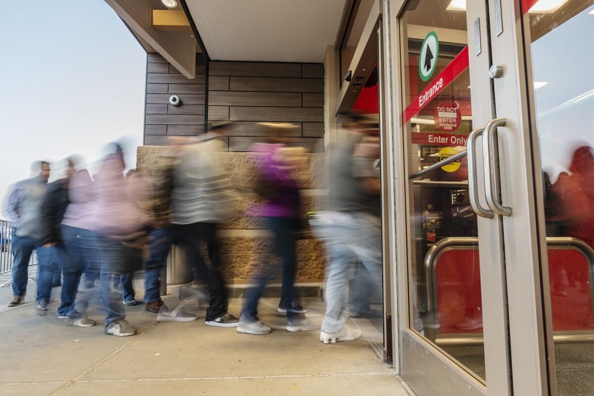 People stream inside of Target on Thanksgiving 2018 in Charleston, W.V.