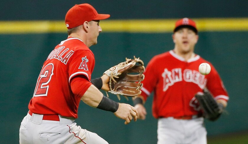 Angels' Johnny Giavotella tries to make a play in center field in the fifth inning against the Houston Astros on Tuesday.
