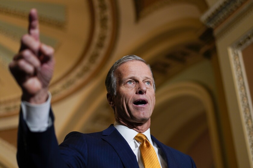 FILE - Sen. John Thune, R-S.D., speaks during a news conference on Capitol Hill in Washington, Dec. 7, 2021. South Dakota political candidates are revving into full campaign mode this week, with a massive exception — John Thune, who has delayed a reelection announcement as he considers stepping away from his post as the second-ranking Republican in U.S. Senate leadership. (AP Photo/Carolyn Kaster File)