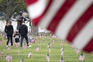 LOS ANGELES, CA - MAY 29: Flags were planted at Los Angeles National Cemetery on Saturday, May 29, 2021 in remembrance of Memorial Day. (Myung J. Chun / Los Angeles Times)