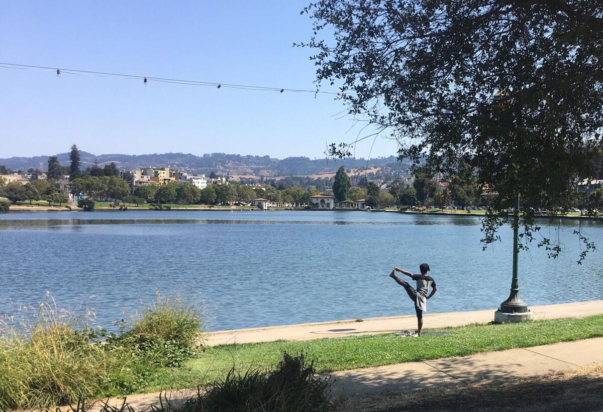 After authorities discouraged crowds over the weekend, Oakland's Lake Merritt returned to normal Monday morning