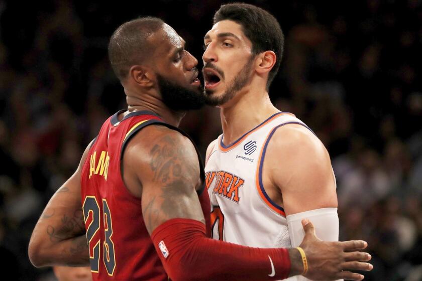 NEW YORK, NY - NOVEMBER 13: LeBron James #23 of the Cleveland Cavaliers and Enes Kanter #00 of the New York Knicks exchange words in the first half at Madison Square Garden on November 13, 2017 in New York City. NOTE TO USER: User expressly acknowledges and agrees that, by downloading and or using this Photograph, user is consenting to the terms and conditions of the Getty Images License Agreement (Photo by Elsa/Getty Images) ***BESTPIX*** ** OUTS - ELSENT, FPG, CM - OUTS * NM, PH, VA if sourced by CT, LA or MoD **