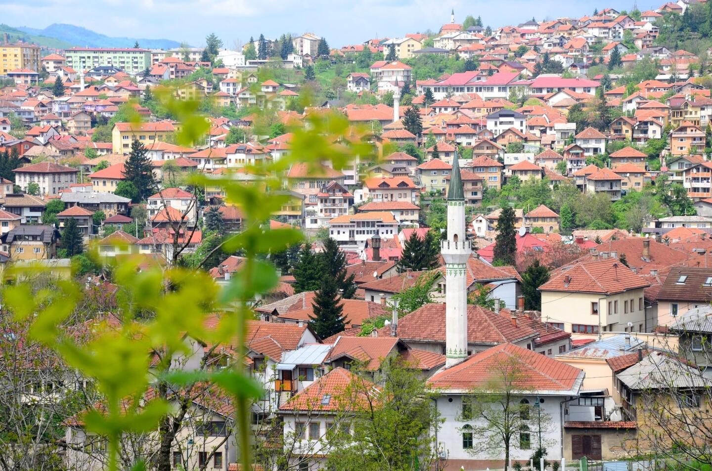 Sarajevans often bring visitors to a hillside site known as the Yellow Fortress, where the city and its surrounding mountains open in wide vistas that include red-tile roofs, mosque minarets and green mountain slopes.