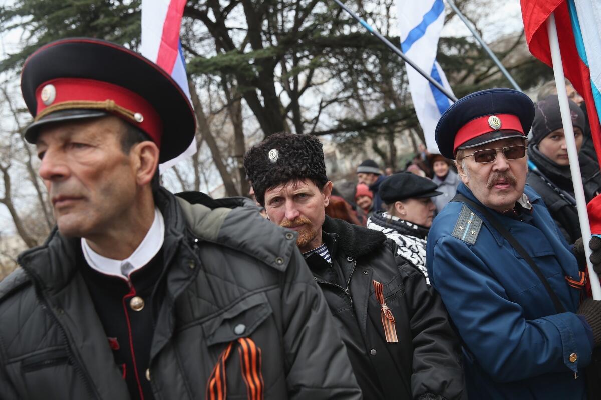 Pro-Russian Cossacks rally outside the Crimean parliament building in Simferopol, Ukraine, on Feb. 28, 2014.