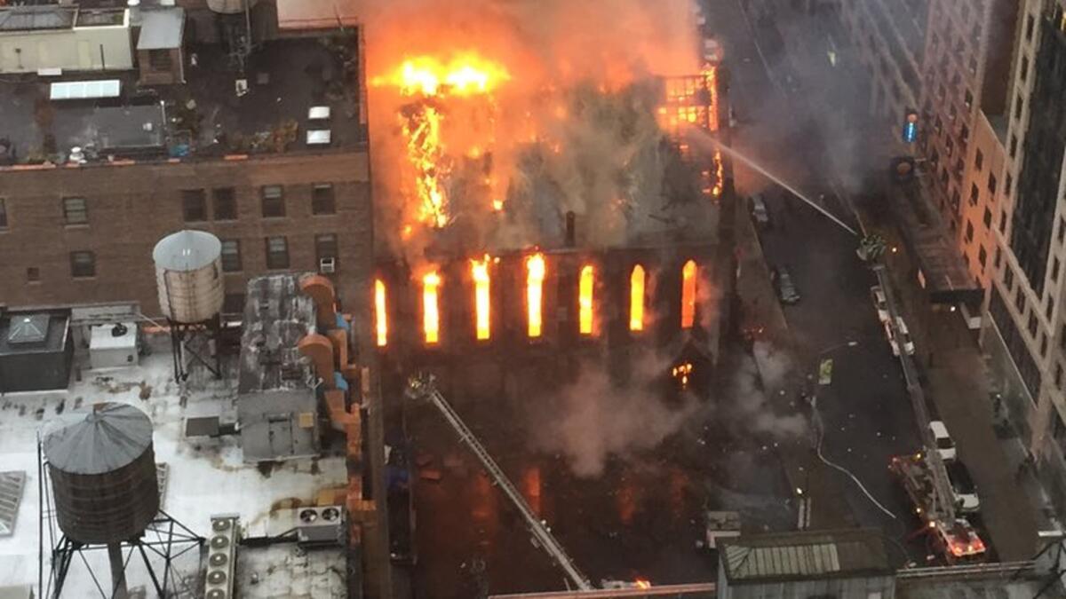 Firefighters battle flames at the historic Serbian Orthodox Cathedral of St. Sava in New York