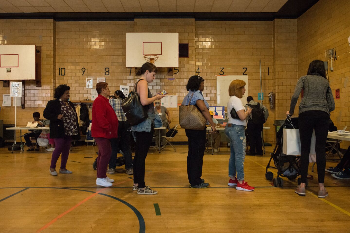 Residents line up to vote in Brooklyn.