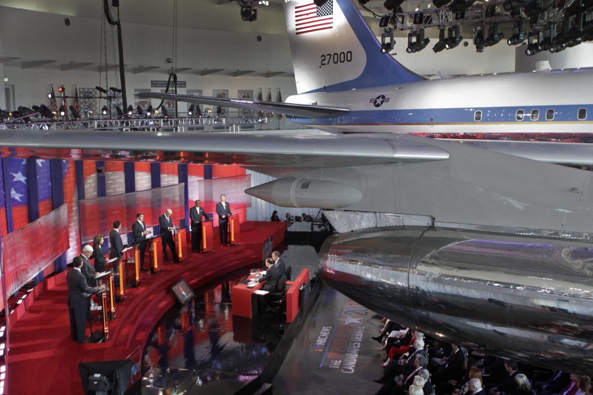 Eight GOP presidential candidates crowded the stage at a debate at the Ronald Reagan Presidential Library in September 2011. Fox News and CNN plan to invite 10 hopefuls to the first two debates of this campaign cycle.